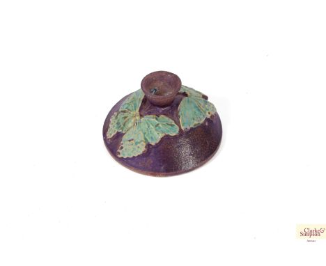 A Bernard Rooke pottery butterfly decorated candlestick