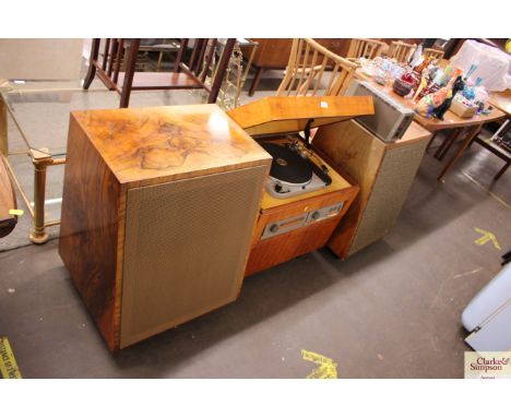 A Quad walnut cased radiogram and floor speakers, with Thorens turntable and a Quad 303 lower amplifier