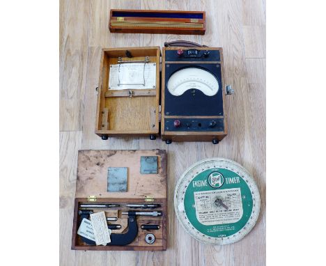 A box containing a quantity of tools to include scales, rule and a voltmeter, etc (a lot) 