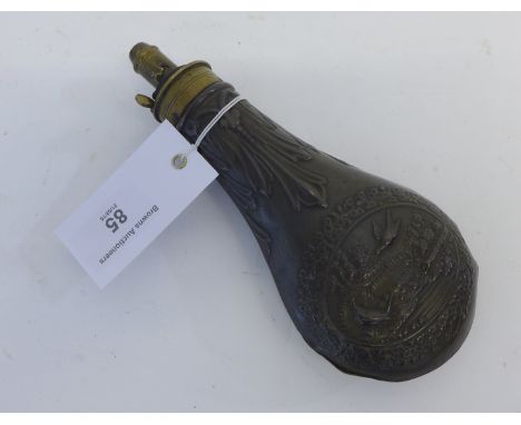 Copper and brass powder flask with game bird decoration in relief