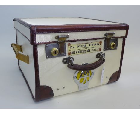 Cream painted and brown leather edged cabin trunk with brass carry handles to sides and an AA car badge to front 