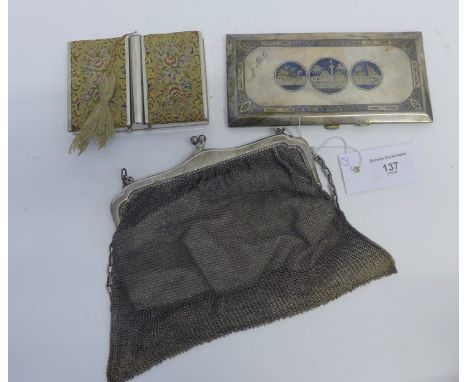 Silver framed chain mesh evening bag, white metal Cairo ware type cigarette case and a tapestry and chrome Lady's compact.  (