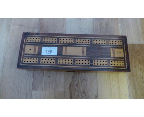 Mahogany games box, the rectangular rosewood top with inlaid cribbage marker panels, opening to reveal a twin card division a