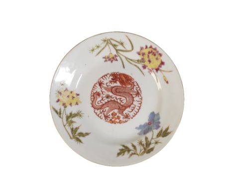 FINE FAMILLE ROSE AND IRON-RED 'DRAGON DISH, GUANGXU SIX CHARACTER MARK IN RED AND OF THE PERIOD centrally decorated in iron-