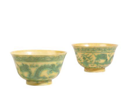 TWO YELLOW AND GREEN ENAMELLED 'DRAGON' BOWLS, KANGXI SIX CHARACTER MARKS BUT 19TH CENTURY each decorated with two four-clawe