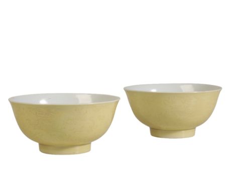 PAIR OF YELLOW-GROUND INCISED 'DRAGON' BOWLS, KANGXI SIX CHARACTER MARK AND OF THE PERIOD the sides finely incised with two f