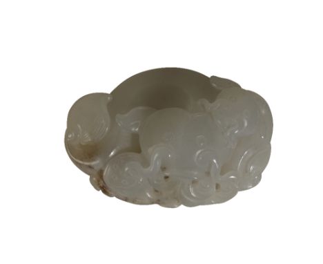SMALL CARVED WHITE JADE GROUP, QING DYNASTY modelled as two catfish and a seed pod, Width: 5cm  