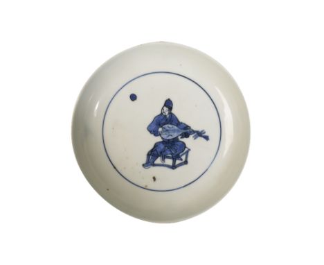 BLUE AND WHITE SAUCER DISH, LATE MING DYNASTY painted to the central roundel with a musician playing a lute seated on a stool