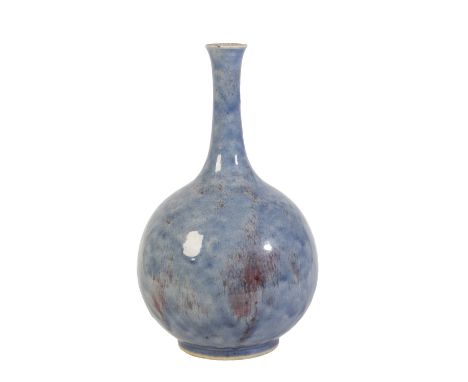 RARE FLAMBE-GLAZE 'OX-BLADDER' VASE, KANGXI PERIOD the slender neck and baluster body covered in a rich lavender-glaze streak