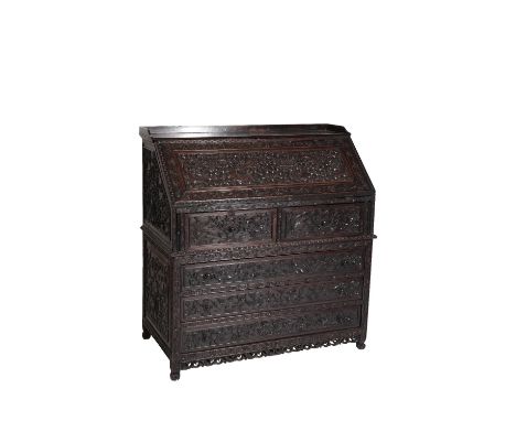 IMPRESSIVE CARVED HUANGHULAI OR HONGMU BUREAU, QING DYNASTY, 18TH / 19TH CENTURY the fall front carved with confronting drago