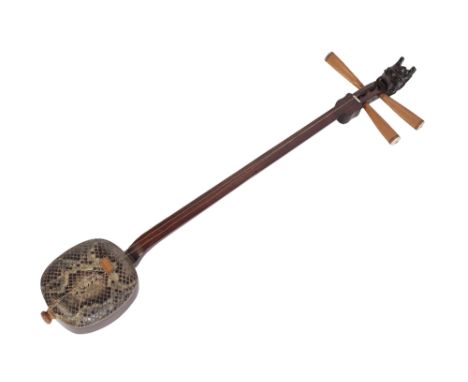 HUANGHUALI AND SNAKE SKIN LUTE (SANXIAN) of typical form with a dragon mask finial, Length: 94cm Provenance: The Martin Laing