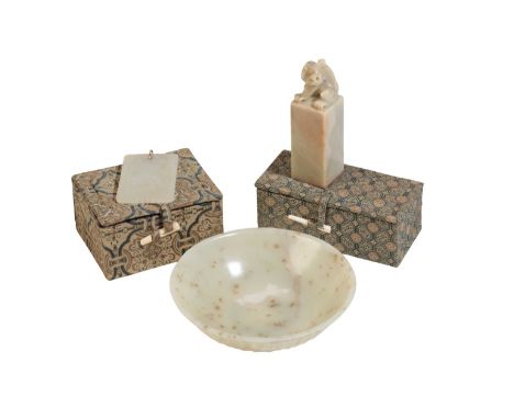 CARVED JADE 'CHRYSANTHEMUM' DISH Diameter: Dish - 11cm , together with a CARVED WHITE JADE PENDANT, AND A SOAPSTONE 'LION' SE