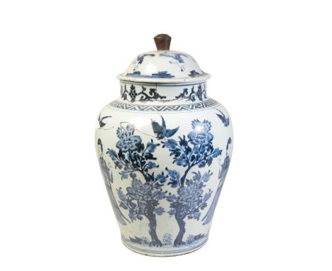 LARGE BLUE AND WHITE COVERED JAR, KANGXI PERIOD painted in tones of cobalt with boy's, elegant ladies, exotic birds and bloss