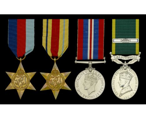 Four: Warrant Officer Class II R. R. Smith, Royal Pioneer Corps, late Manchester Regiment and Auxiliary Military Pioneer Corp