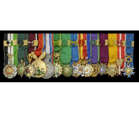 A mounted group of fifteen miniature dress medals  Jordan, Hashemite Kingdom, Order of the Renaissance, with first class rose