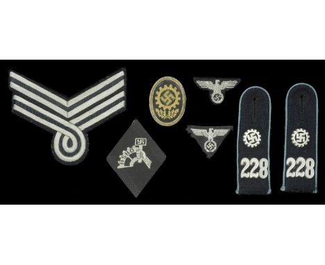 German Second World War NSBO and DAF Insignia. A matched pair of enlisted ranks DAF  shoulder boards, black central body, lig