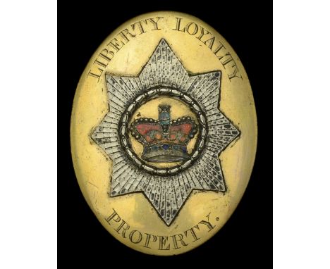 A Georgian Shoulder Belt Plate. An Unknown Georgian period Shoulder Belt Plate, gilt oval design with engraved ‘Liberty Loyal