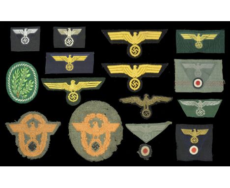 German Second World War Cloth Insignia. Comprising a Field Police arm badge, as removed from tunic, well worn, orange on gree