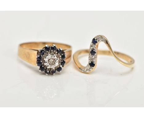 TWO 9CT GOLD SAPPHIRE RINGS, the first a sapphire and diamond cluster, comprising of twelve circular cut sapphires and one ro