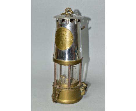 A MINER'S SAFETY LAMP, of brass and chrome construction marked 'The Protector Lamp and Lighting Co. Ltd, Eccles, Type GR6S, M