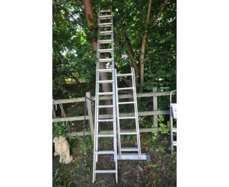 A SET OF DOUBLE EXTENSION LADDERS, with wheels, length 3.5M together with a platform ladder with 2 x 6 rungs (2)