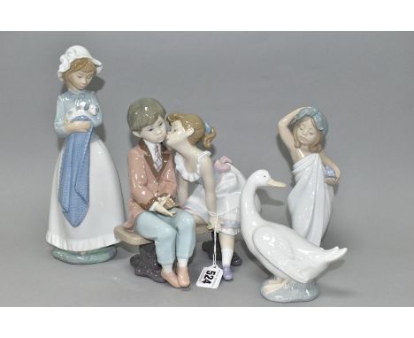 TWO LLADRO FIGURES AND TWO NAO FIGURES, comprising 'Ten and Growing' No 7635, depicting girl kissing boy on a bench, modelled