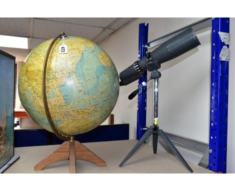 A TABLE GLOBE AND A SPOTTING SCOPE WITH TRIPOD, comprising a George Philip &amp; Son Ltd Worldmaster table globe, dated 1963,