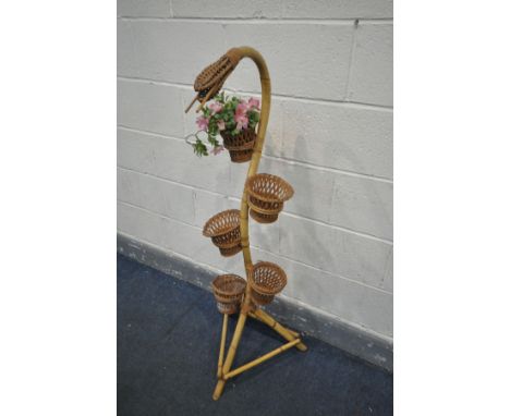 A MID CENTURY BAMBOO SNAKE PLANTER, complete with five bamboo baskets, height 124cm