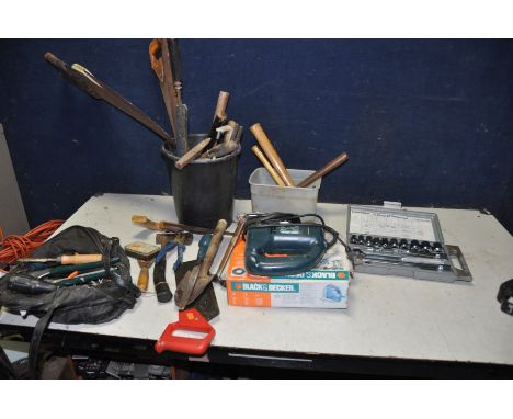A BLACK AND DECKER JIGSAW (PAT pass and working) and a quantity of hand tools including a Halfords socket set, saws, hammers,