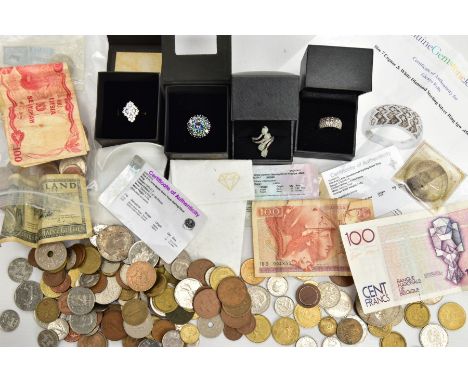 FOUR RINGS AND A SMALL QUANTITY OF COINS, to include a boxed white metal cluster ring set with mystic topaz, stamped 925, rin