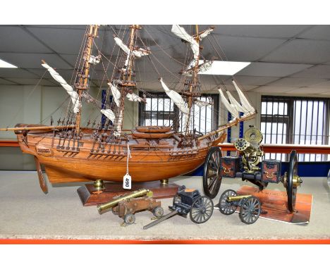 A MODEL OF HMS BOUNTY AND MODEL CANNONS, a late twentieth century wooden model ship by Maquettes P. Bauwens of Mauritius, wit