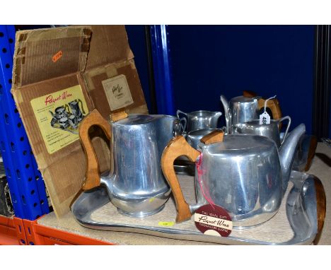 A MID TWENTIETH CENTURY PICQUOT WARE TEA SERVICE AND TEAWARES, comprising a five piece service of teapot (original tag attach