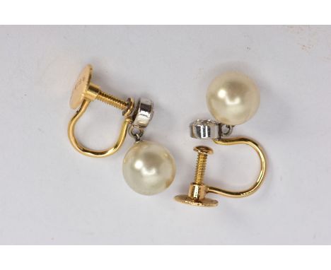 A PAIR OF YELLOW METAL EARRINGS, non-pierced screw back earrings each set with an old cut diamond in a milgrain bezel setting