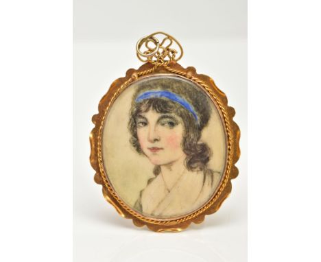 A YELLOW METAL HAND PAINTED PORTRAIT PENDANT, of an oval form, panel detailing a lady in profile with a blue headband, in a y