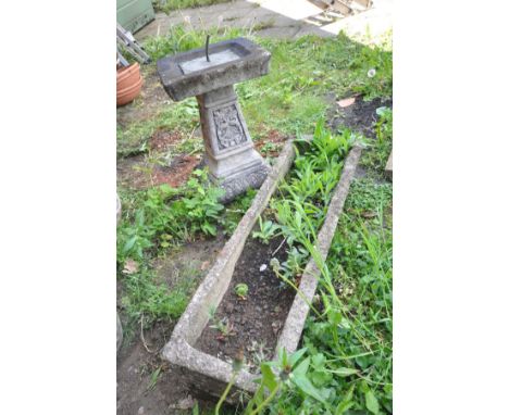 A COMPOSITE RECTANGULAR PLANTER, length 92cm x width 27cm together with a composite two piece birdbath with sundial to top, h