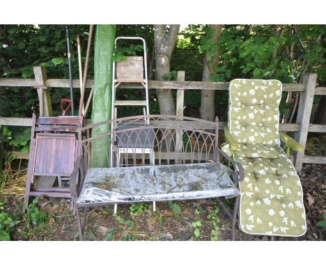 A METAL FRAMED GARDEN BENCH, plastic folding garden lounger, two folding wooden chairs, quantity of garden tools etc
