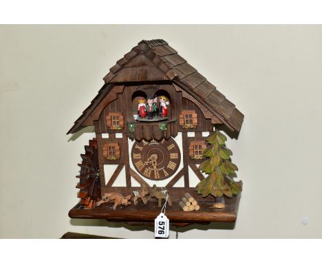 A LATE 20TH CENTURY SCHNEIDER MUSICAL CUCKOO CLOCK, approximate height 35cm, in need of some attention, two chains not attach