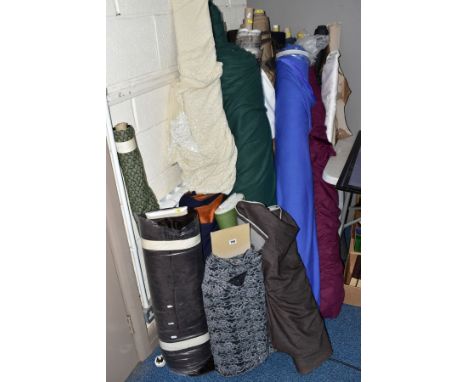 NINETEEN ROLLS OF FABRIC, for upholstery and dressmaking, including lighter weight, fleece and heavier fabrics in a variety o