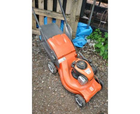 A HUSQVARNA LC 247S PETROL LAWN MOWER with a Briggs and Stratton 450 series engine and grass box (engine pulls freely but not
