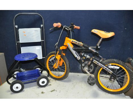 A ACTION MAN MOUNTAIN BIKE 12in frame along with a wheeled stool and a small step ladder (3)