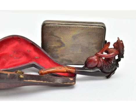 A MEERSCHAUM PIPE AND SILVER COMPACT,  the meerschaum pipe detailing a lady playing an instrument, together with a silver com