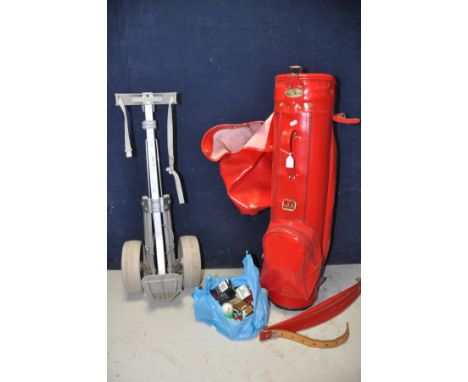 A RED LEATHER LOOK GOLF BAG along with a Powa Caddy pullman and a bag of golf balls (3)