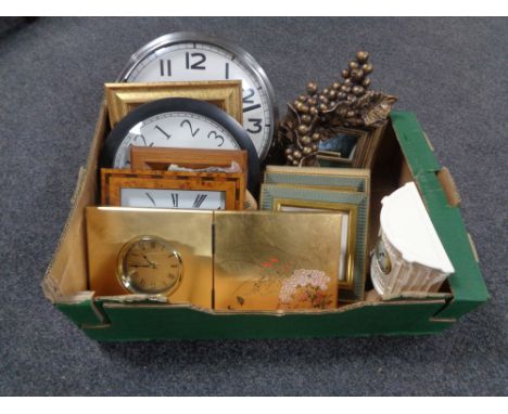 A box containing contemporary framed prints and mirrors, sorted wall clocks, a Royal Cream ware mantle clock.   