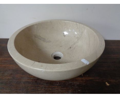 A marble hand basin.  CONDITION REPORT: diameter 40 cm height 15 cm 