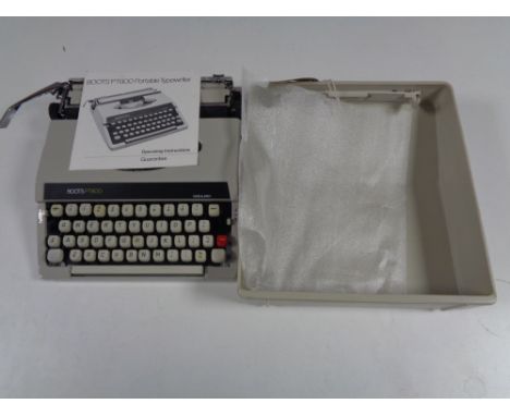 A cased Boots PT800 portable typewriter with original instructions. 