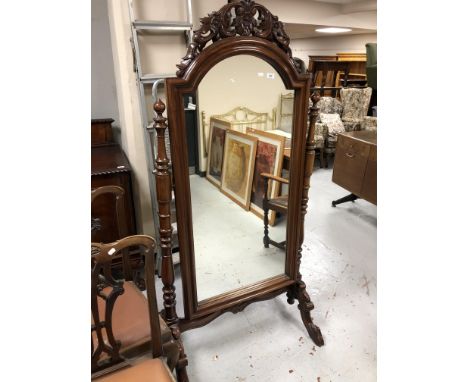 A reproduction mahogany Victorian style cheval mirror 