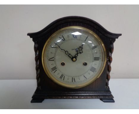A 20th century oak case Smith's mantel clock. 