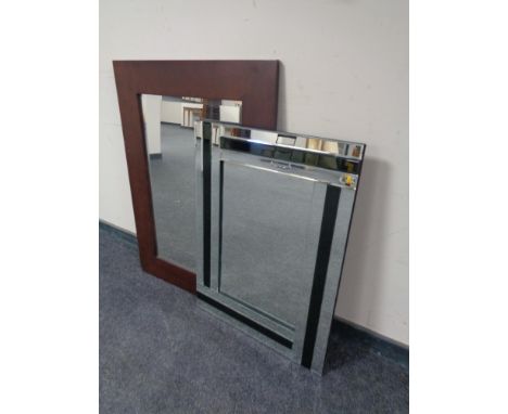 A contemporary wood framed bevel edge mirror together with an all glass framed mirror. 