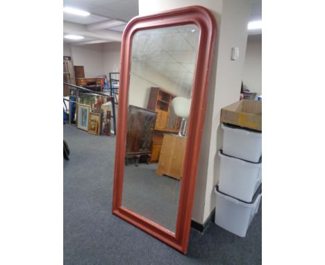 A contemporary painted framed arch topped mirror. 
