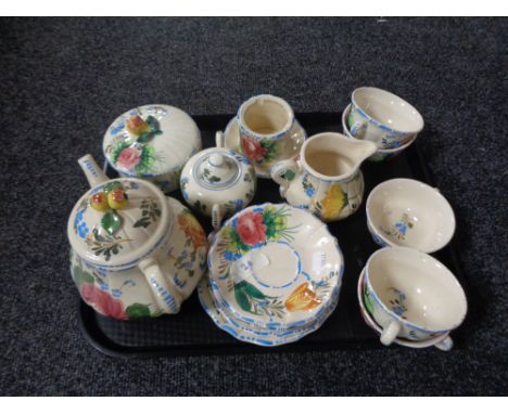 A 19 piece Italian floral patterned pottery tea service. 